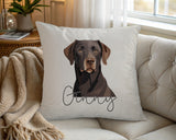 Personalised Chocolate Labrador name cushion on a chair by the window
