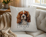 Personalised Cavalier King Charles Spaniel name cushion on a chair by the window