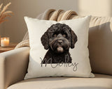 Personalised Black Cockapoo name cushion on a sofa