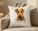 Personalised Airedale Terrier name cushion on a sofa
