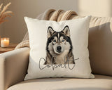 Personalised Alaskan Malamute name cushion on a sofa