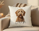 Personalised Labradoodle name cushion on a sofa