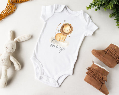 a baby&#39;s bodysuit with a lion on it